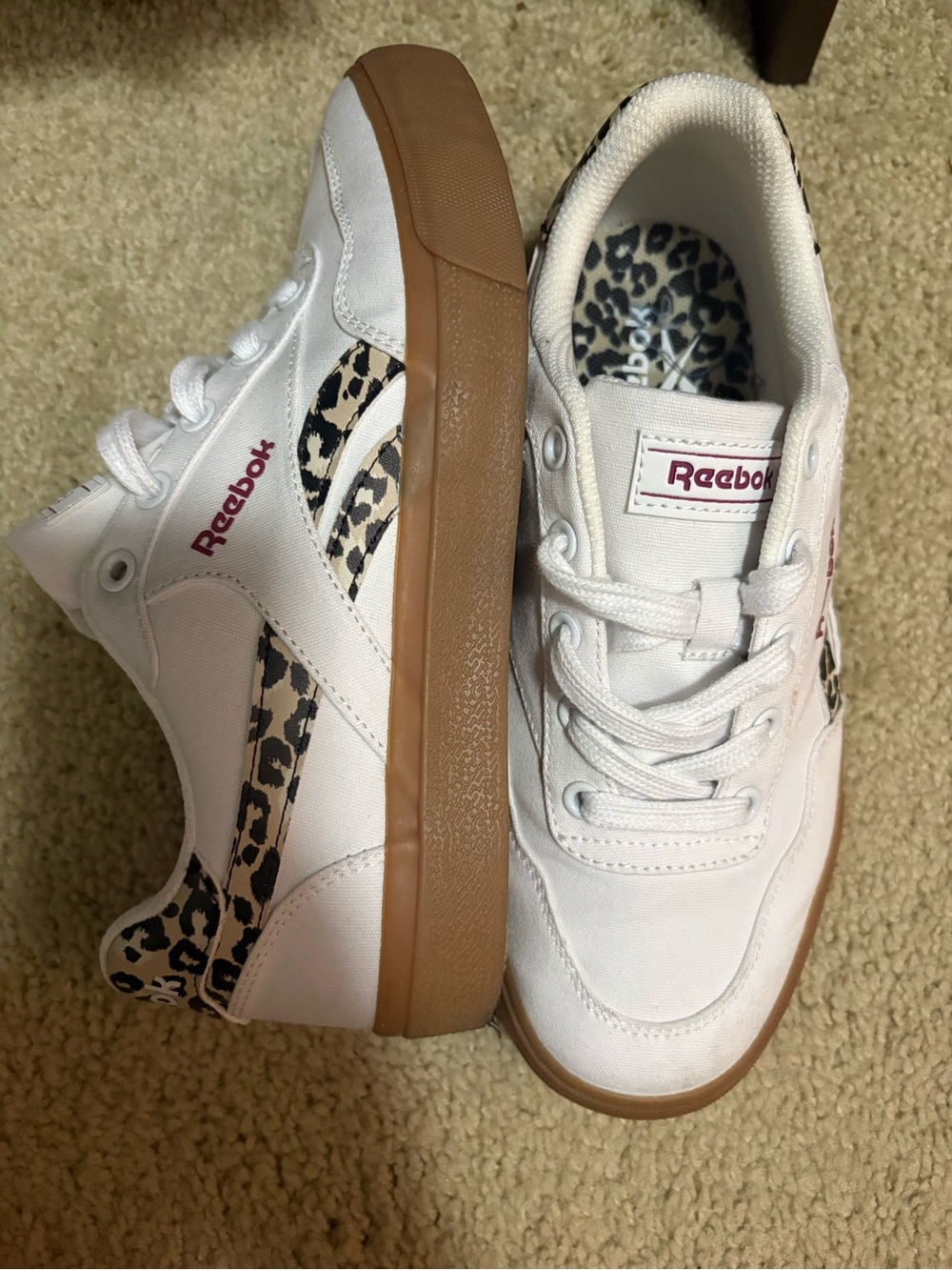 Reebok Women’s  White Sneakers with Leopard Accent and Gum Sole